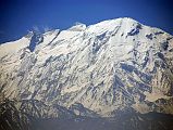 Mustang 02 05-2 Annapurna East, Annapurna Central, Annapurna Main, and Tilicho Peak From Pass After Samar Here is a close up view of Annapurnas East, Central, and Main summits from the top of the pass (about 4000m) on the way to Rangbyung Cave in Upper Mustang. The snowy mountain on the right is Tilicho Peak (7134m), the highest point of the Grande Barrierre. Tilicho Peak was first climbed via the northwest shoulder on October 10, 1978 by Emmanuel Schmutz of France.